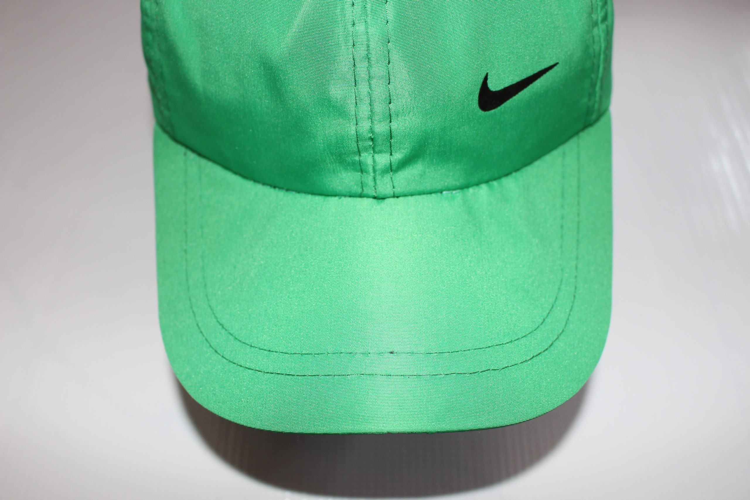 کلاه نایکی تاسلون